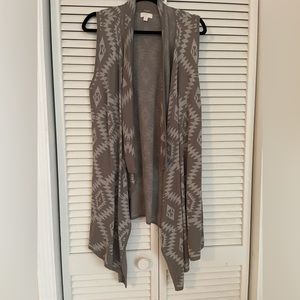 Charming Charlie open sleeveless sweater for women